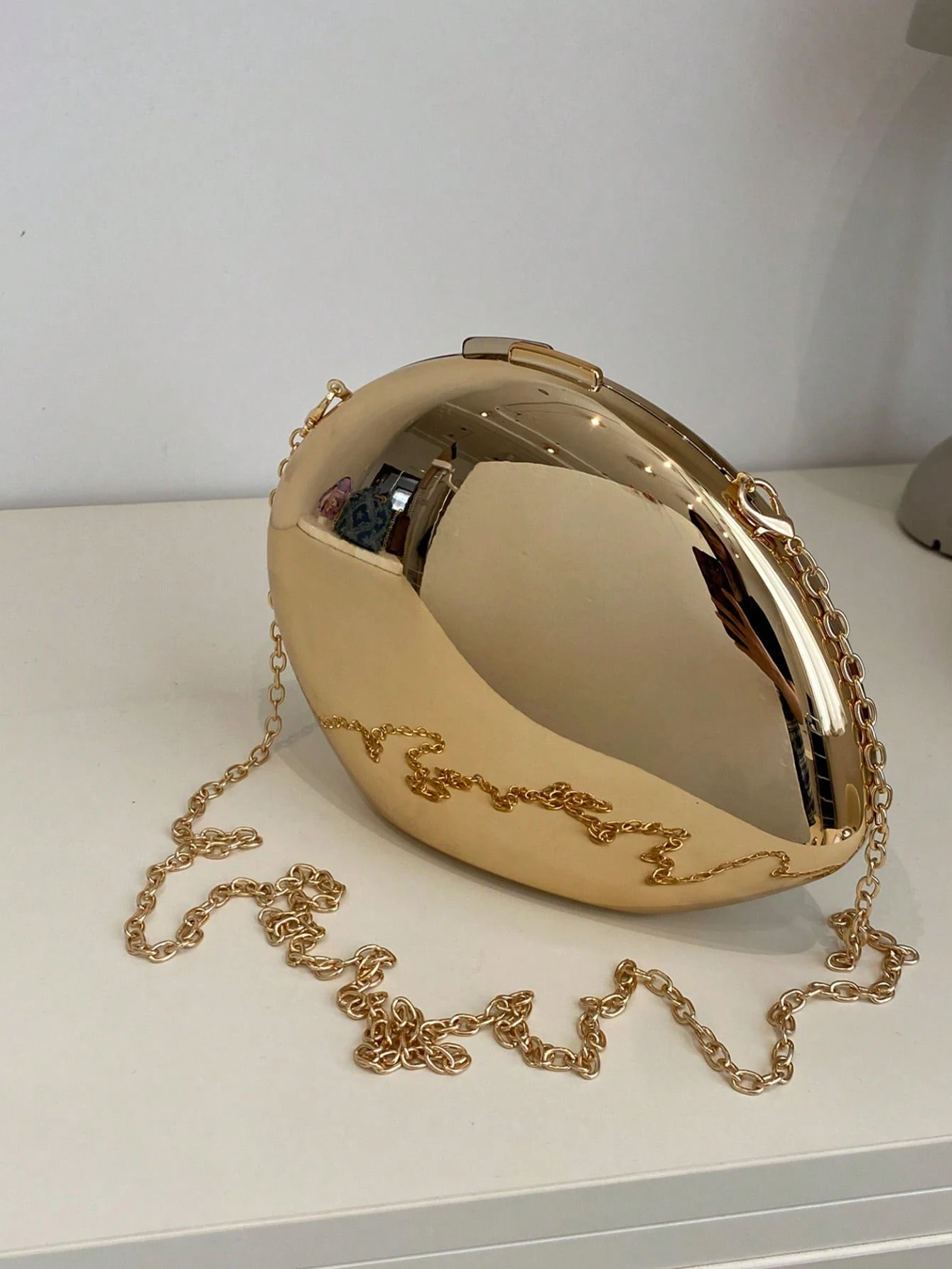 8 Glossy Gold Oval Clutch - Image 1